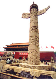 Obelisk marble columns engraved with entwisting dragons and clouds - an ornamental architecture called Huabiao in front of the Tian'anmen
